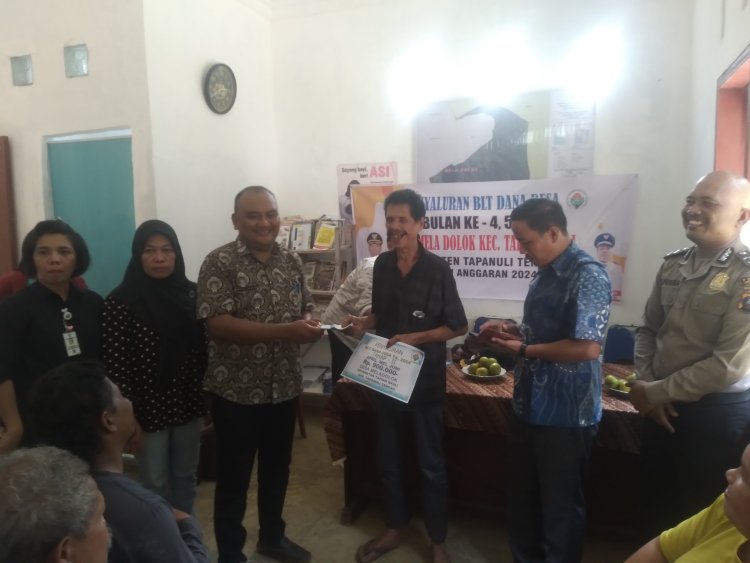 Pemdes Mela Dolok Salurkan BLT DD kepada Warganya, kades : "Desa Mela Dolok Tak Pernah Ada Lumbung Desa"