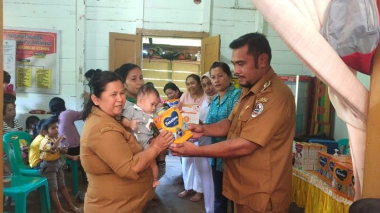 Untuk Tingkatkan Kemampuan Kognitif Anak, Pemdes Rampah Beri Susu dan Vitamin Bagi Balita 